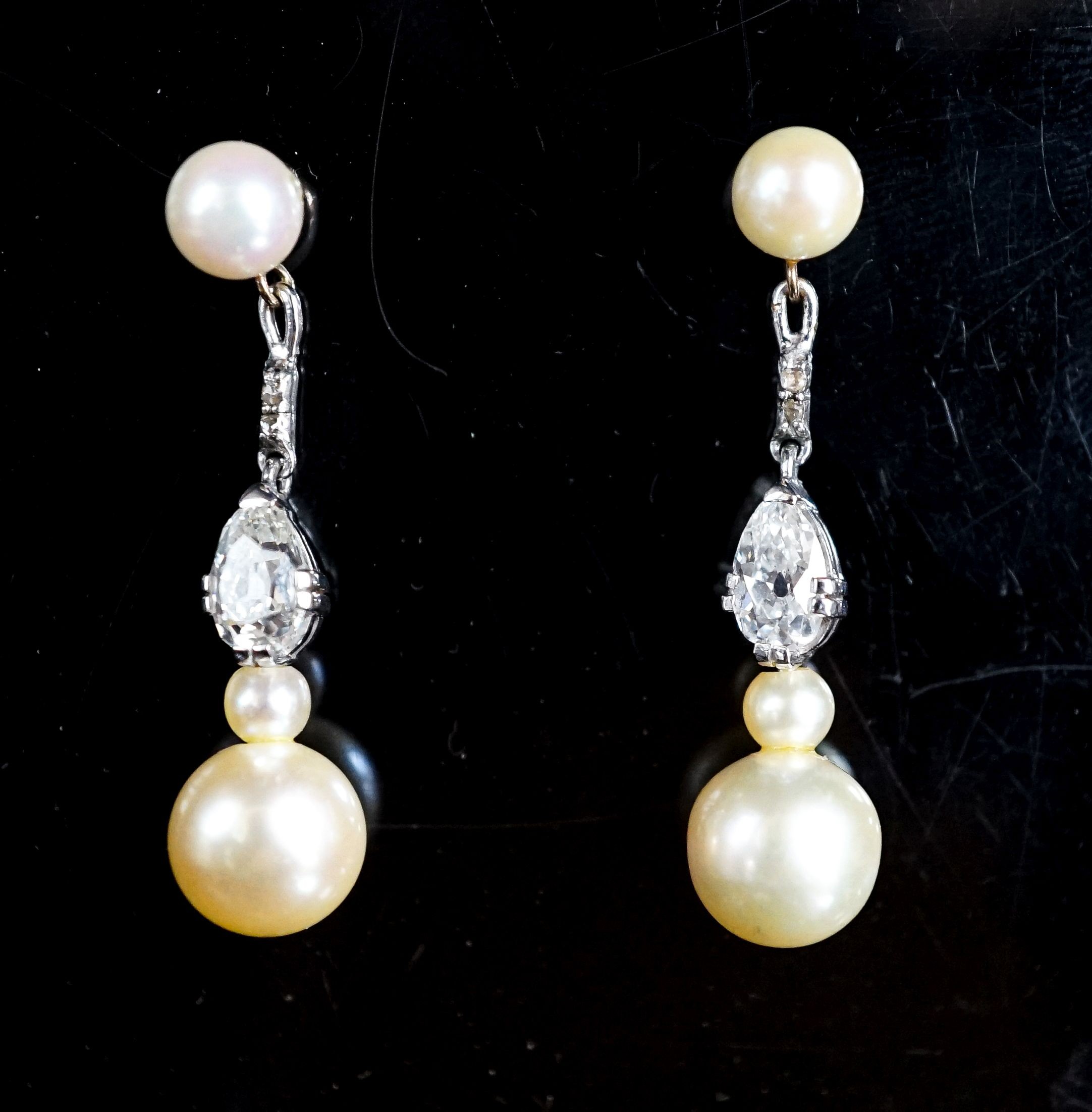 A pair of yellow and white metal, cultured pearl and pearl cut diamond set drop earrings, 37mm, gross weight 5.7 grams.